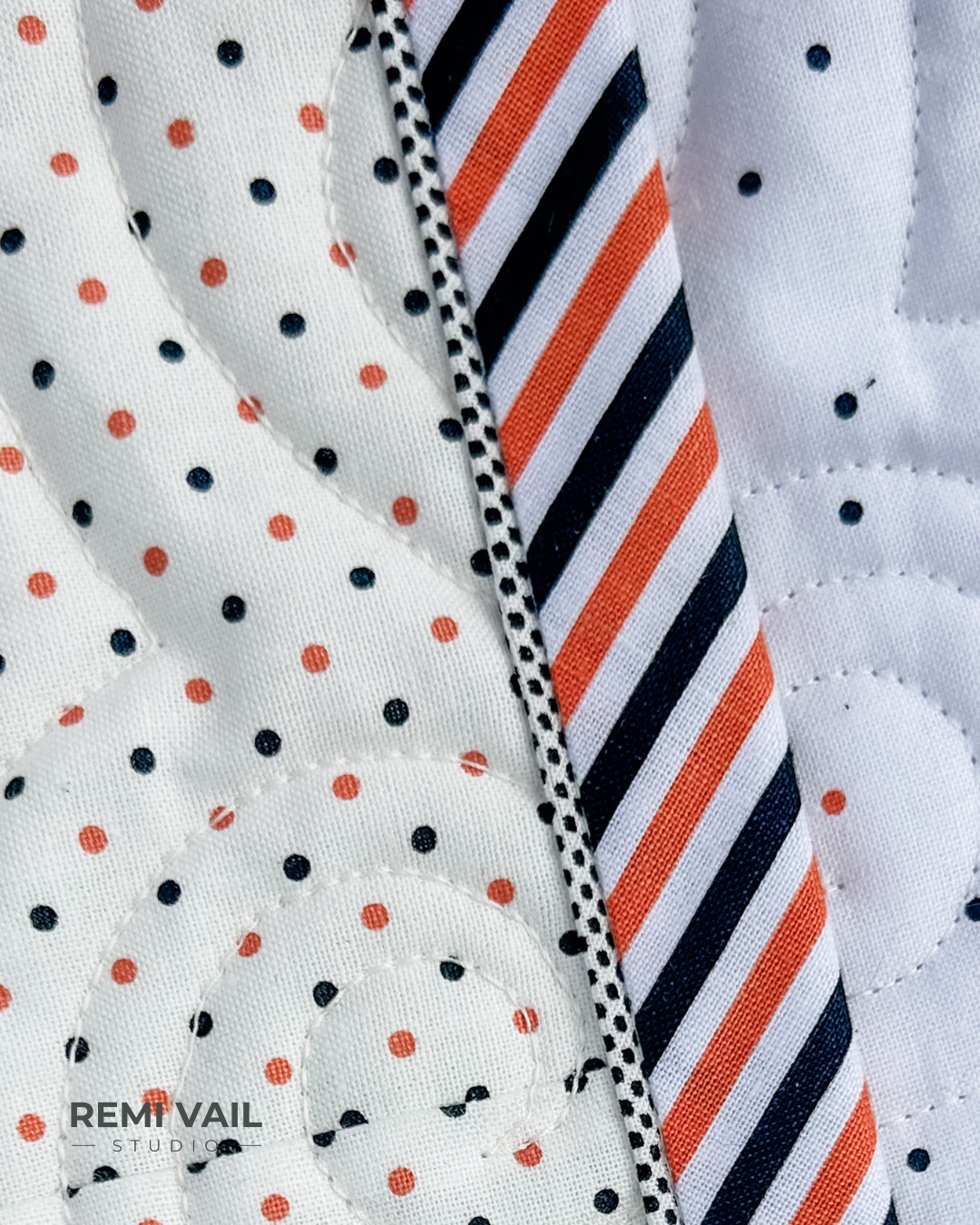 Flange binding using a halloween stripe basic fabric and poparazzi basic fabric from Riley Blake Designs. Made and photographed by Tamara Darragh for Remi Vail Studio.