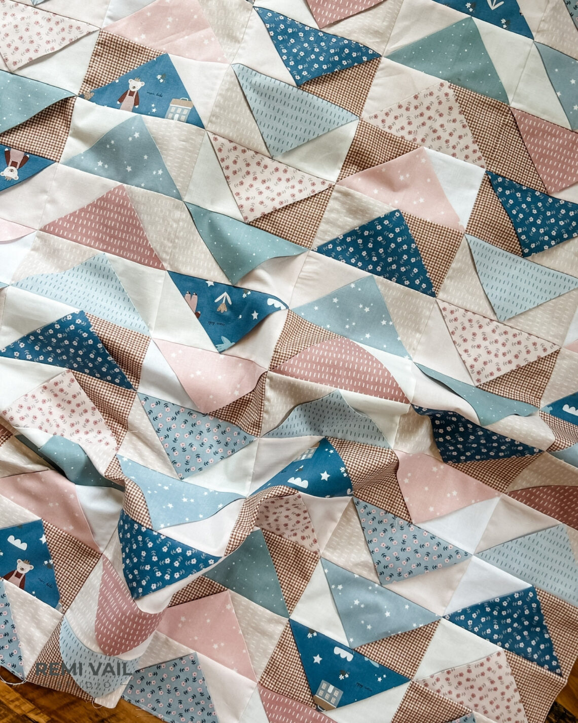 Front Porch Quilt made by Remi Vail Studio using the Cozy Bebe fabric collection by Riley Blake Designs.