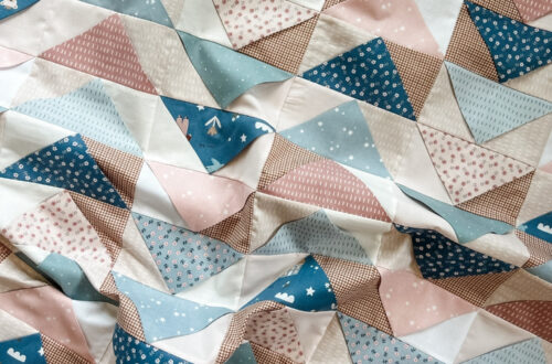 Front Porch Quilt made by Remi Vail Studio using the Cozy Bebe fabric collection by Riley Blake Designs.
