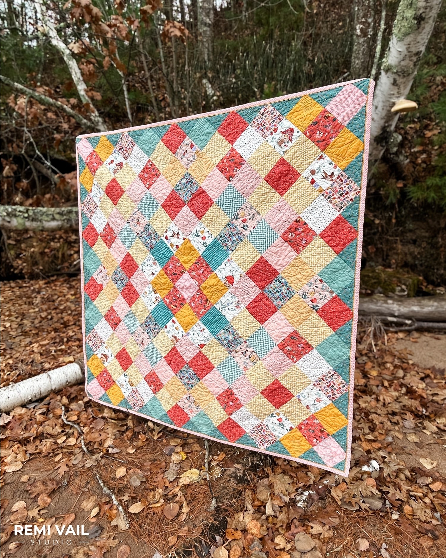 Thimbelina Fabric Collection by Jennifer Long for Riley Blake Designs. Quilting by Tamara Darragh for Remi Vail Studio using the Charming One Pattern. 
