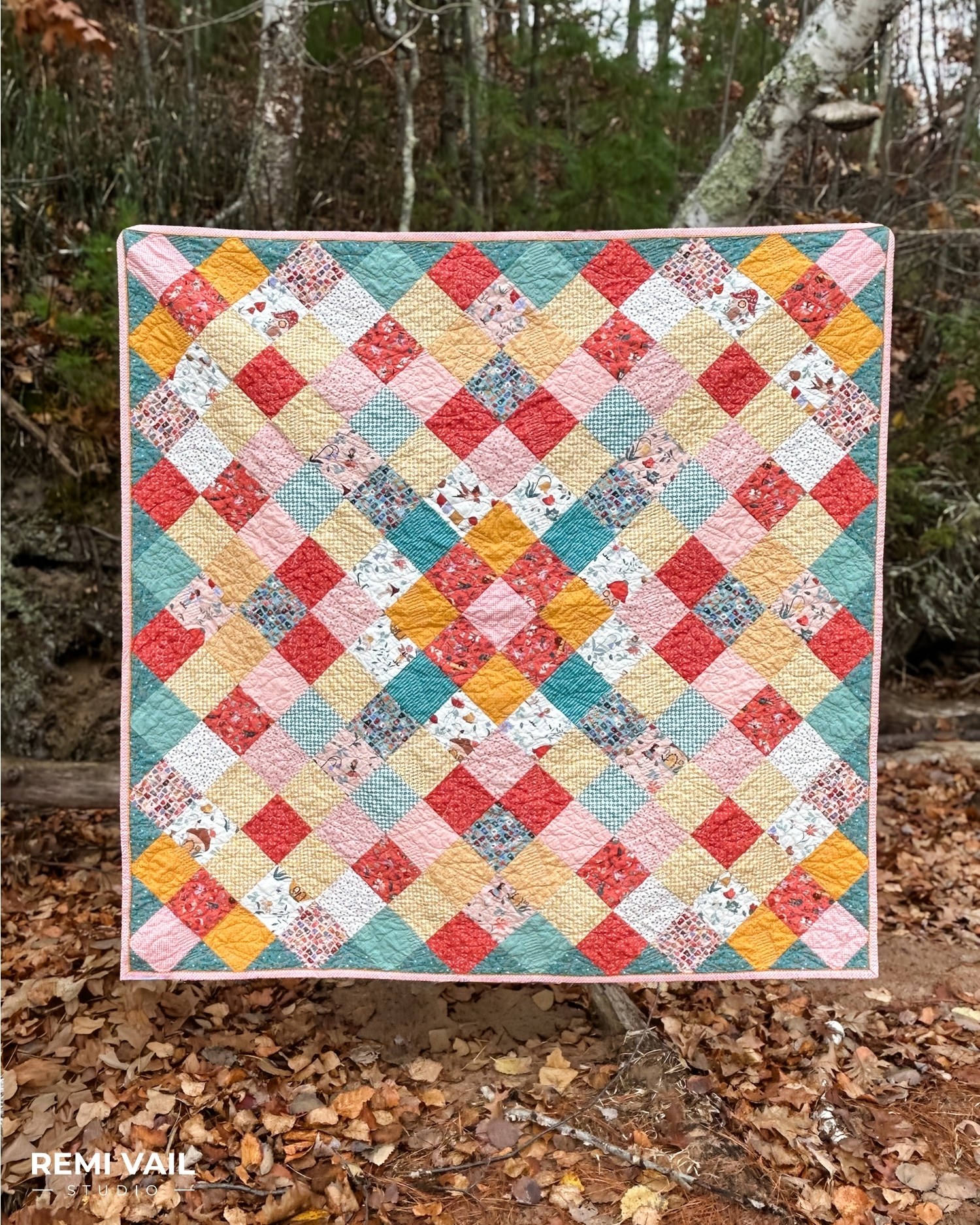Thimbelina Fabric Collection by Jennifer Long for Riley Blake Designs. Quilting by Tamara Darragh for Remi Vail Studio using the Charming One Pattern. 