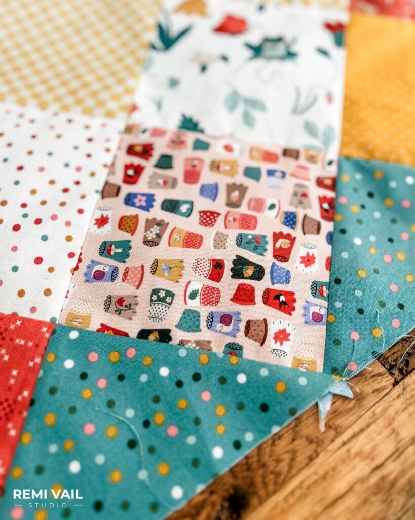 Thimbelina Fabric Collection by Jennifer Long for Riley Blake Designs. Quilting by Tamara Darragh for Remi Vail Studio using the Charming One Pattern. 