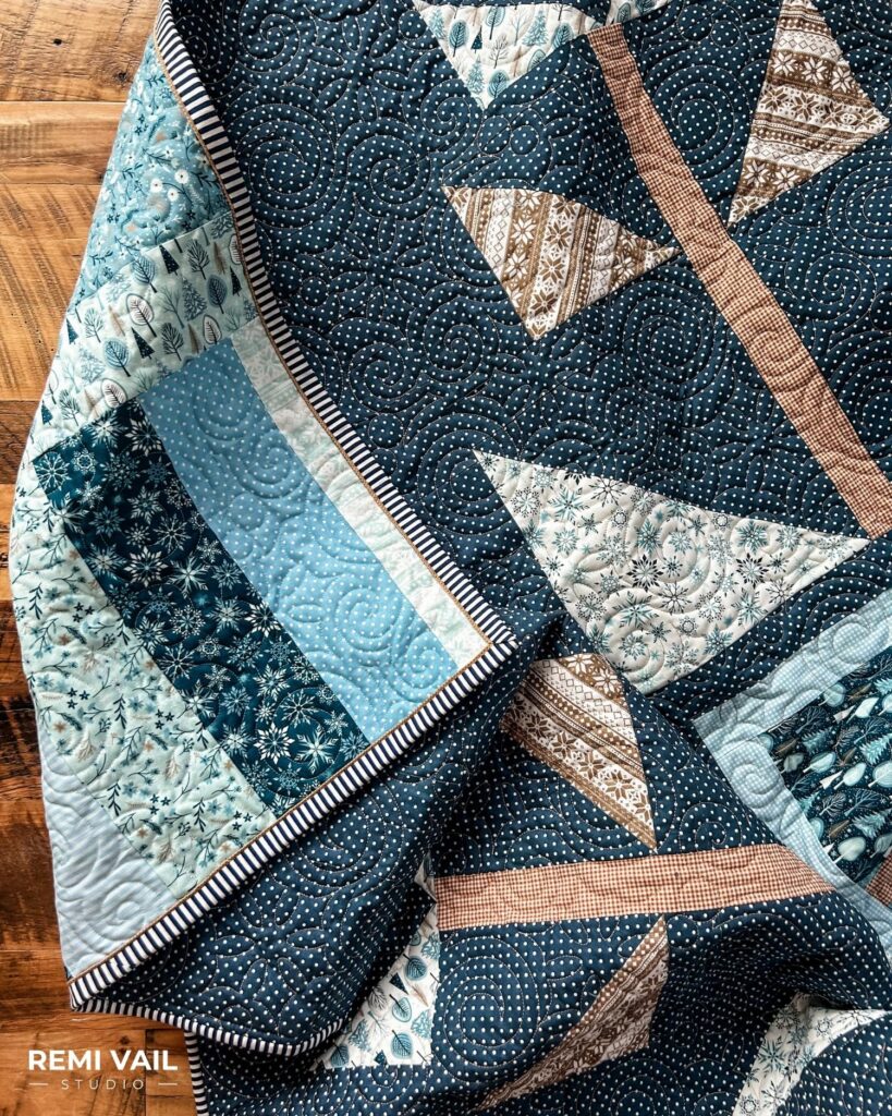 Lumi Quilt by Remi Vail Studio made by Tamara Darragh using the Winter Magic Fabric Collection designed by Dani Mogstad for Riley Blake Designs. 
