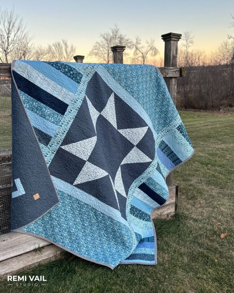 Lumi Quilt by Remi Vail Studio made by Tamara Darragh using the Winter Magic Fabric Collection designed by Dani Mogstad for Riley Blake Designs.