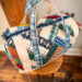 Patchwork Duffle made from Plaid Venture Club Fabric Collection. Made by Tamara Darragh of Remi Vail Studio. Duffle sitting on stool.